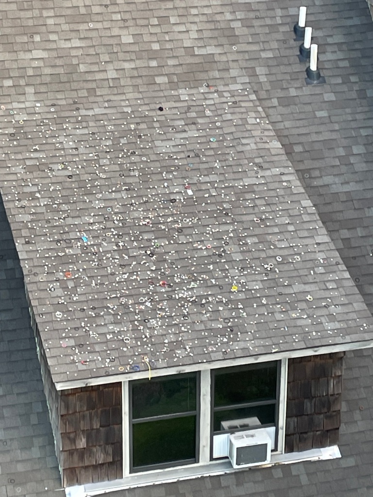 Coins thrown on roof from Anakeesta chairlift